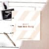 zwangerschapsboek met achternaam pastel beige